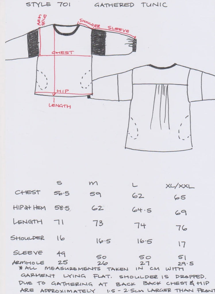 Fashion design sketch of a gathered tunic with measurements and style details.