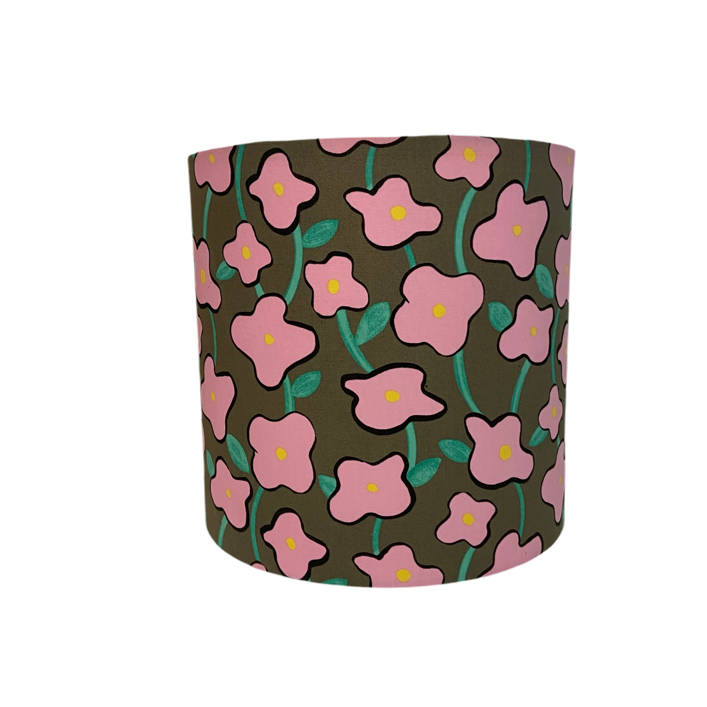 Floral-patterned lamp shade with pink flowers on a brown background