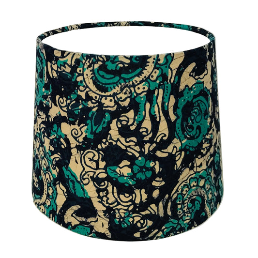 Decorative lampshade with a paisley pattern on a white background