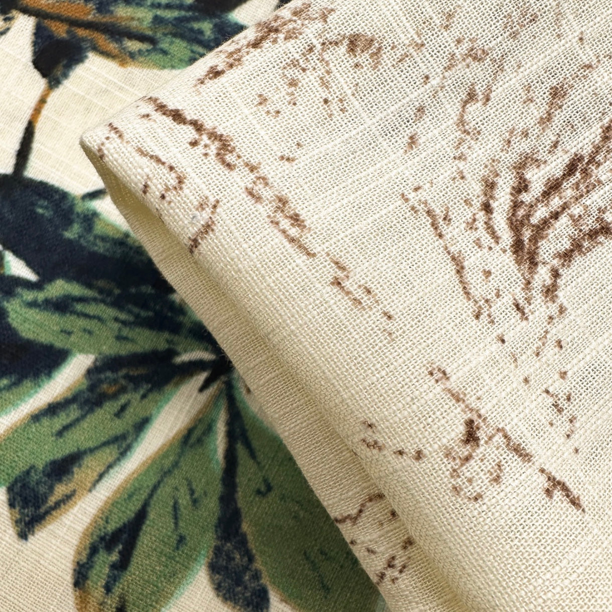 Close-up of fabric with a floral pattern showing the linen blend textured fabric