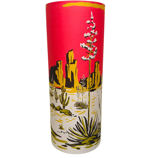 Cylindrical lampshade with desert landscape design on a white background