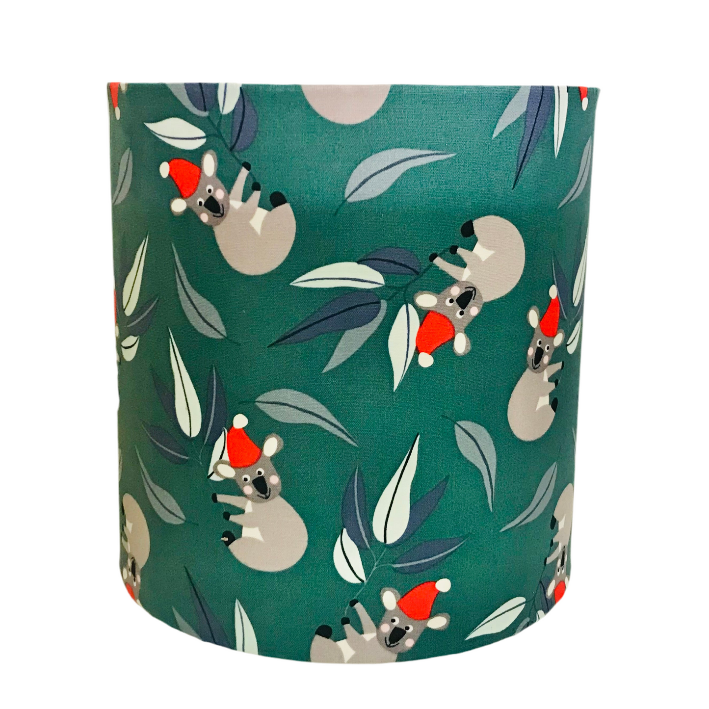 Fabric lamp shade with koala in santa hat pattern on a green background