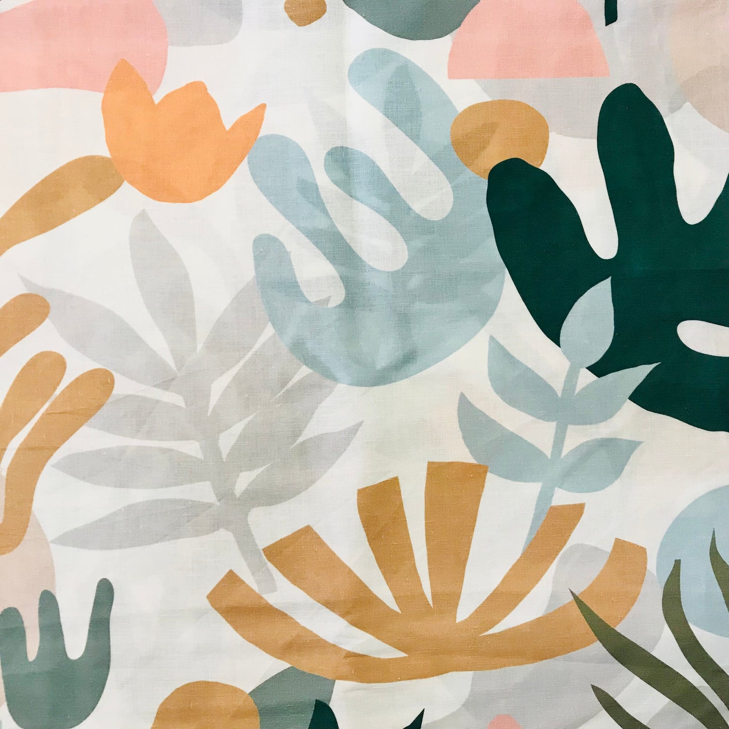 Pattern of colorful leaves on a light background