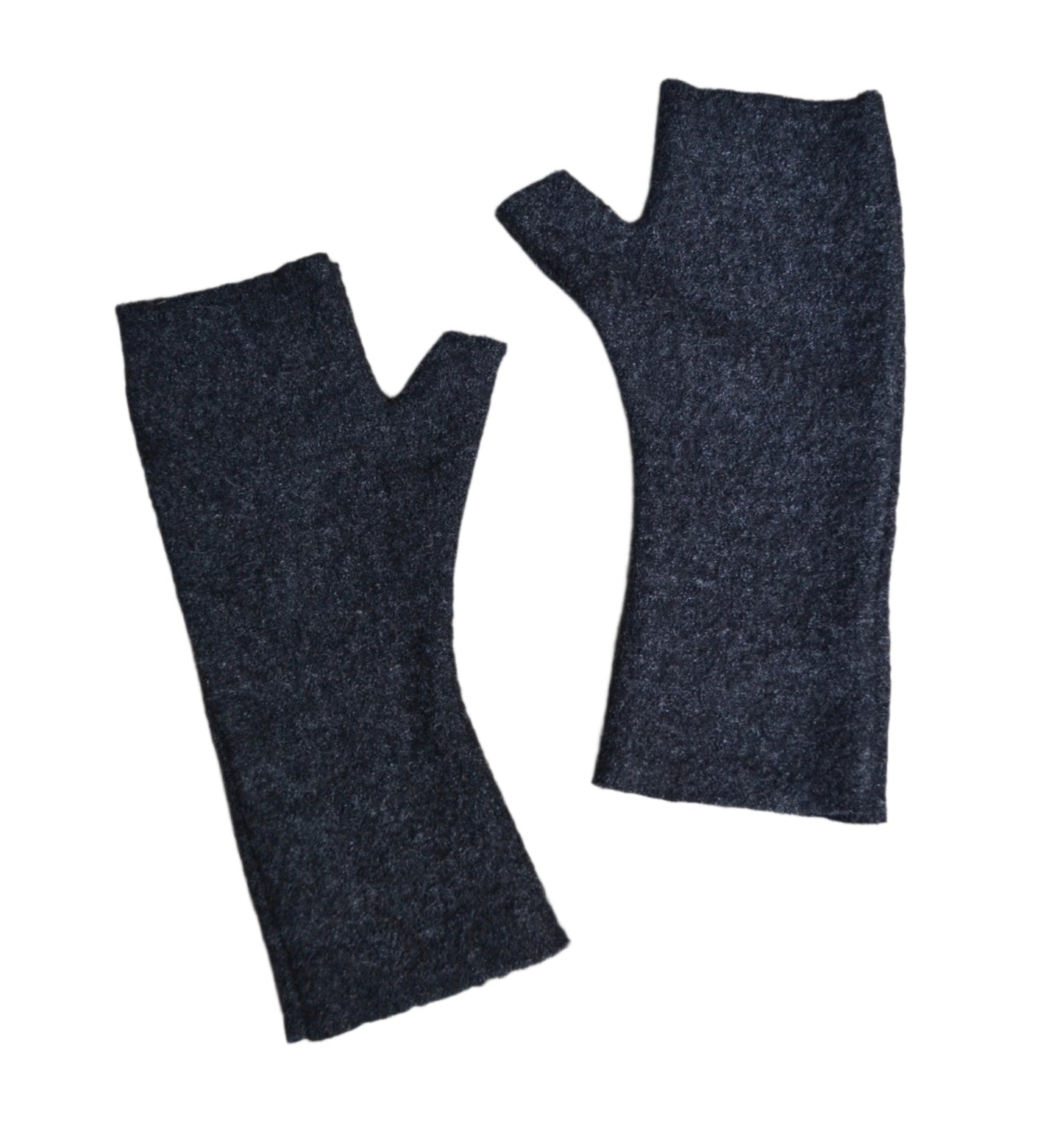 Pair of dark gray fingerless gloves on a light stone surface