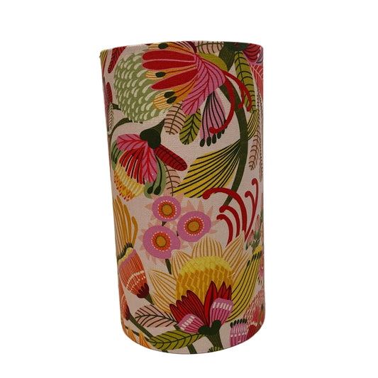 Cylindrical lamp shade with floral pattern on a white background