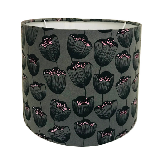 Lampshade with black floral pattern on a gray background