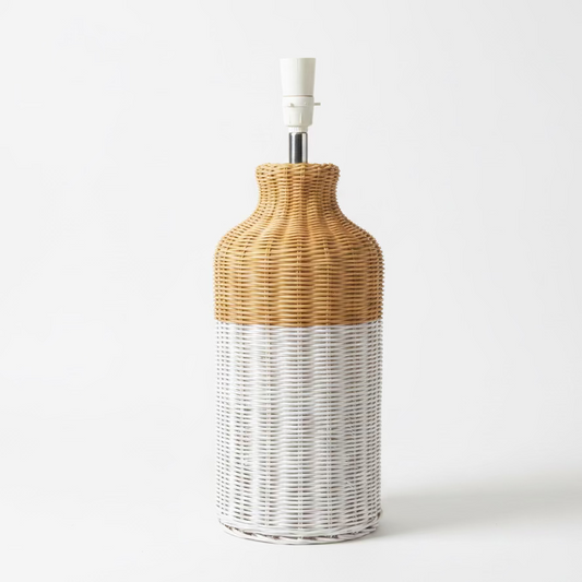 A tall decorative lamp bases with a woven wicker-style finish, featuring a natural tan upper section and a white lower section, placed on a white background