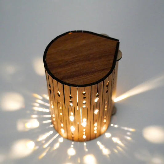 Wooden lamp with a textured surface on a white background