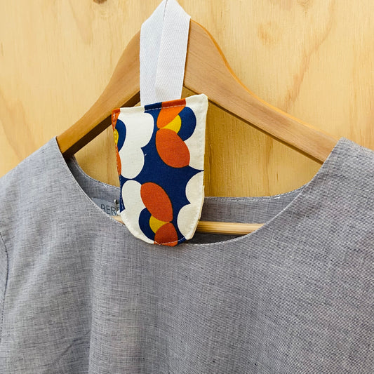 small hanging pouch filled with lavender to hang in your wardrobe or place in your clothing drawers to leave the space gmelling fresh. This set of four pouches have a retro floral textile.