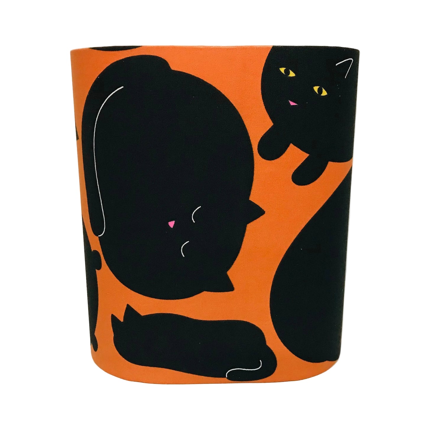 A cylindrical lampshade featuring a bold orange and black cat pattern, with black cat silhouettes and small yellow and pink eye details, set against a plain white background.