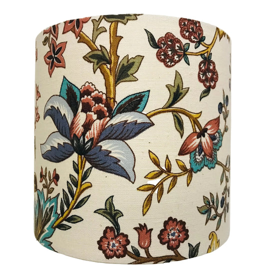 Cylindrical fabric lampshade with floral pattern on a white background
