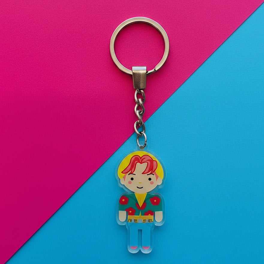 Keychain with a colorful character on a textured surface