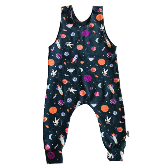 Children's handmade baby romper overalls with space-themed pattern on a white background