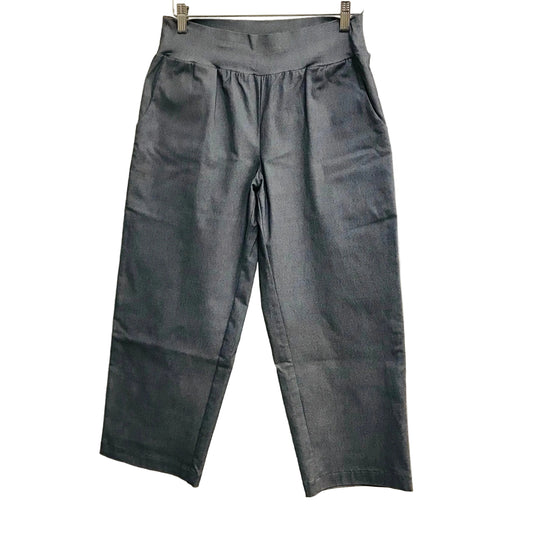 Gray pants hanging on a white background
