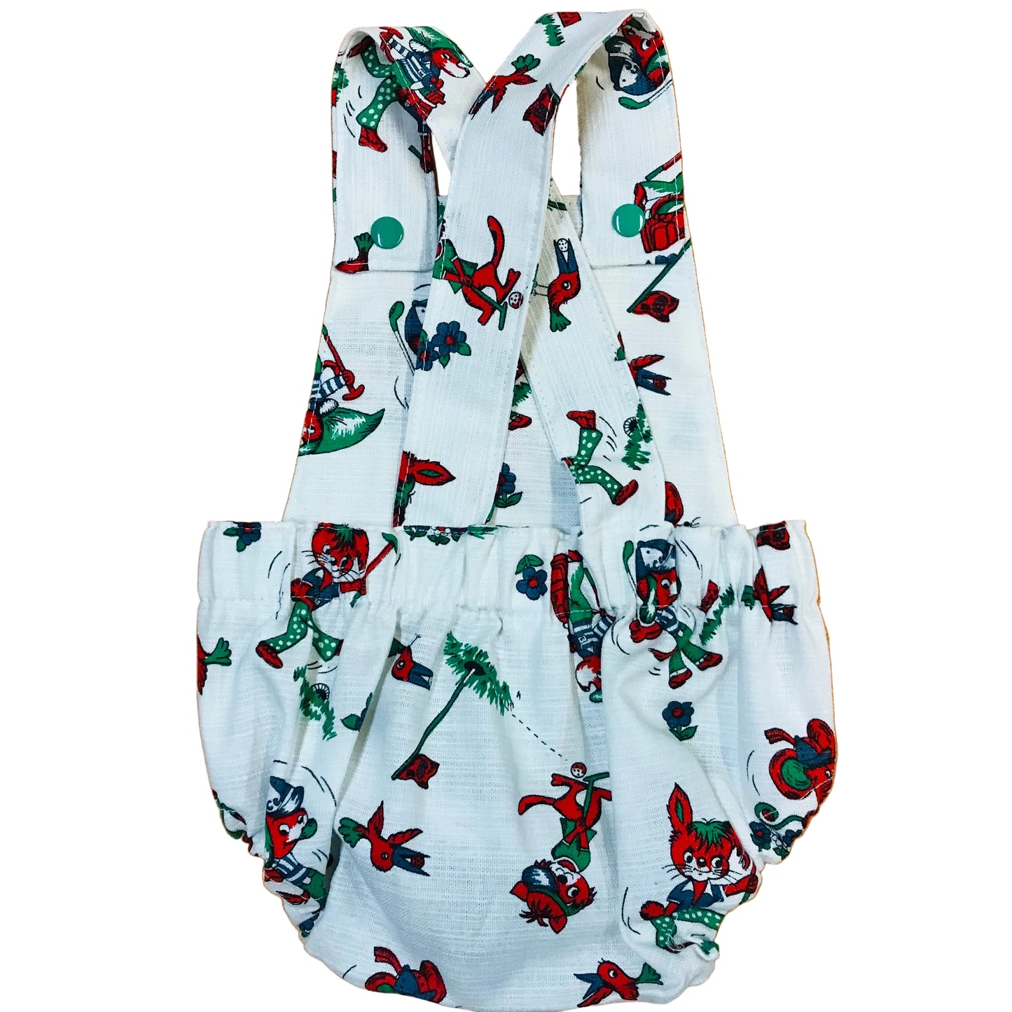 Children's romper with cartoon character print on a wooden surface