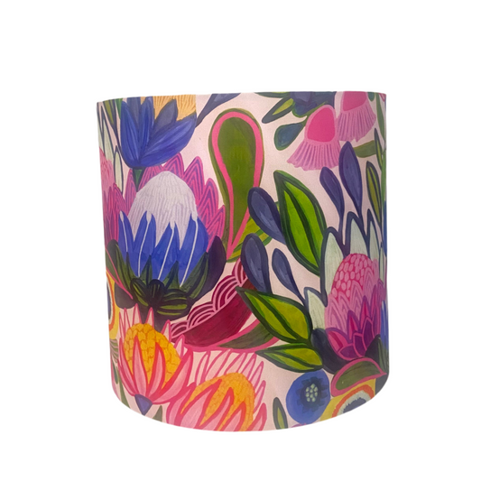 Colorful floral-patterned lampshade on a white background