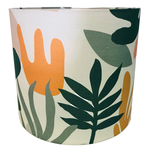 Cylindrical container with leaf pattern on a white background