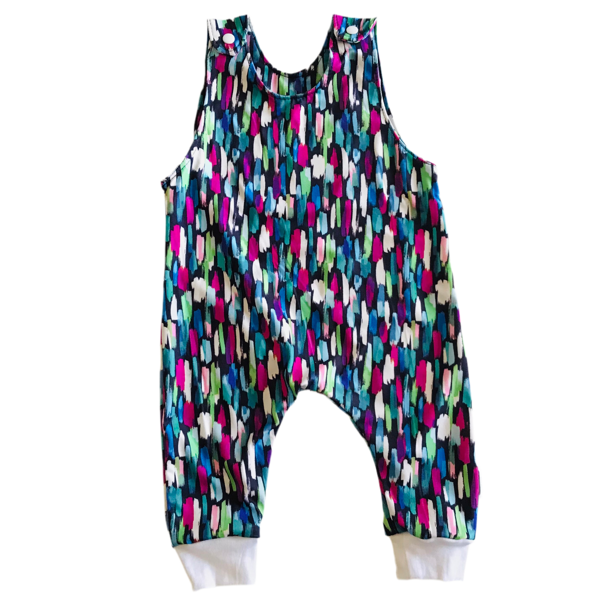 Colorful sleeveless romper with abstract pattern on a white background