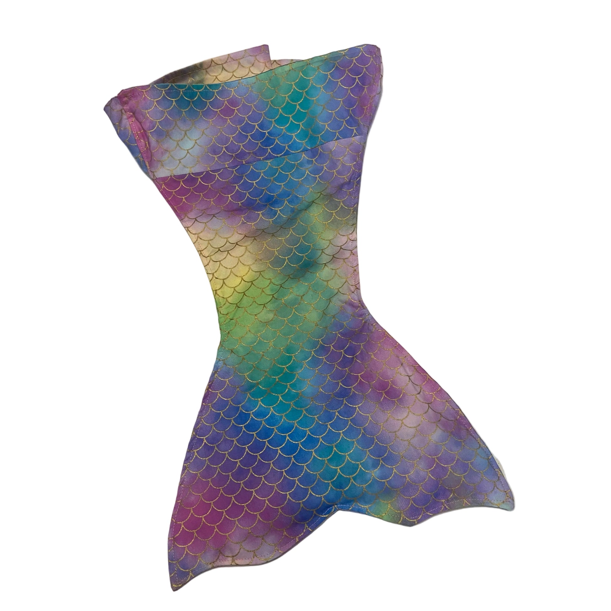 Colorful mermaid tail on a white surface