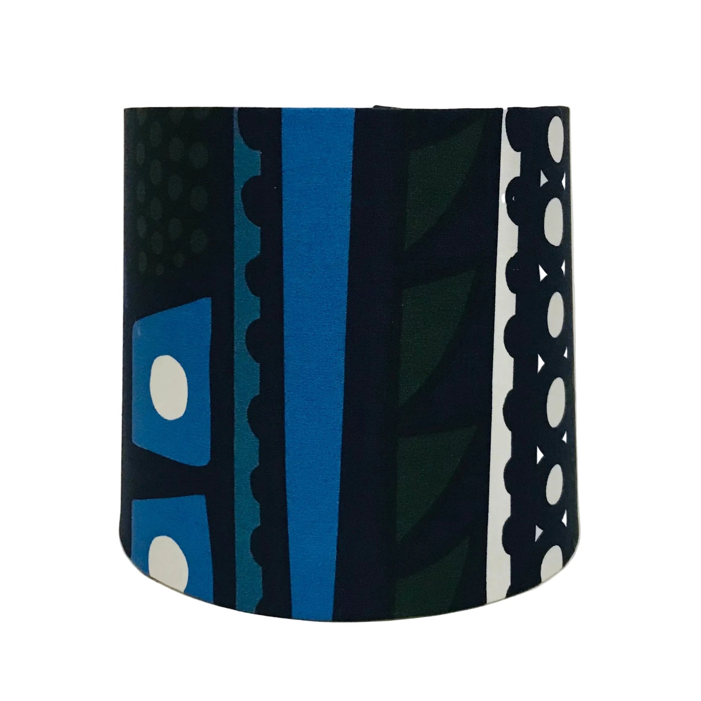 A fabric drum lampshade featuring a bold, vertical geometric pattern in blue, navy, white, and dark green, displayed against a plain white background.