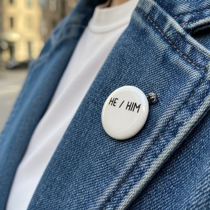 gender pronoun badge with 'HE / HIM' 