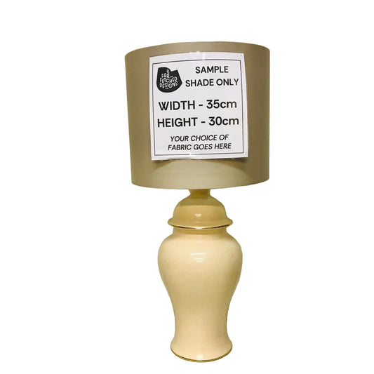 Lamp with a sample shade on a white background