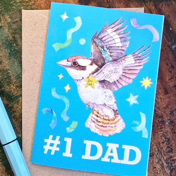 Greeting card with a bird illustration and '#1 DAD' text on a blue background