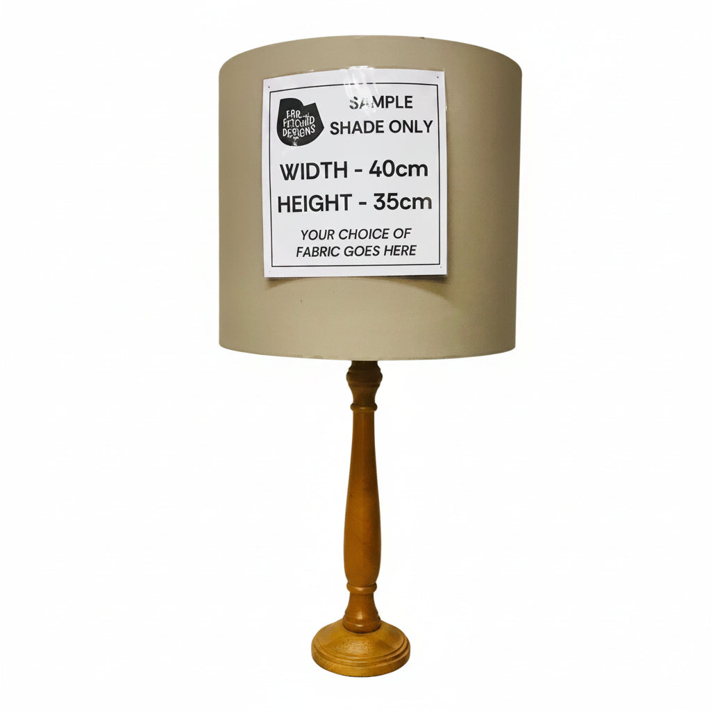Lampshade with wooden stand on a white background