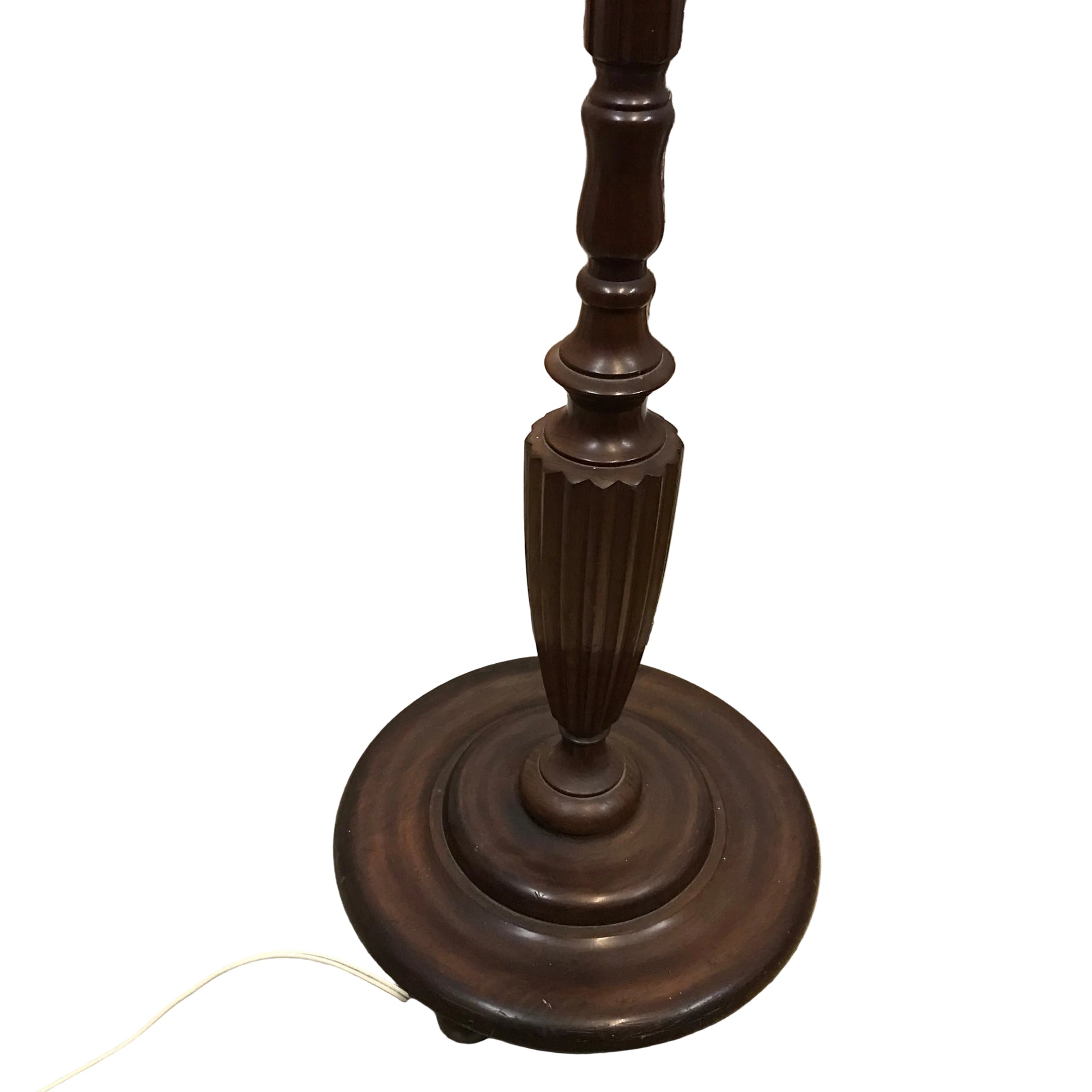 Dark wooden floor lamp detail