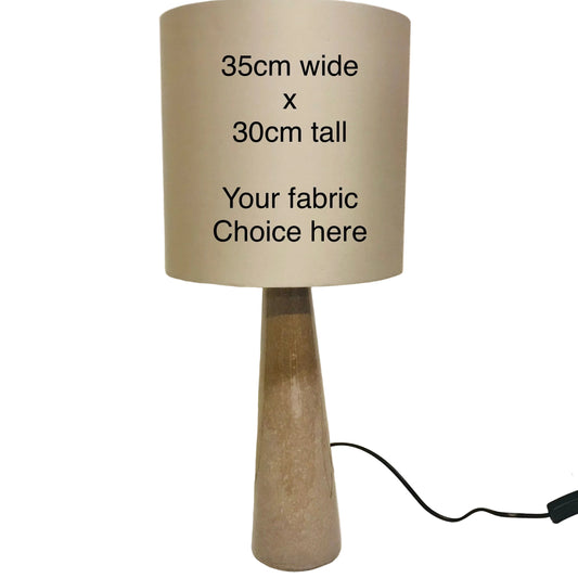 Table lamp with beige fabric shade and wooden base, text indicating size and fabric choice.