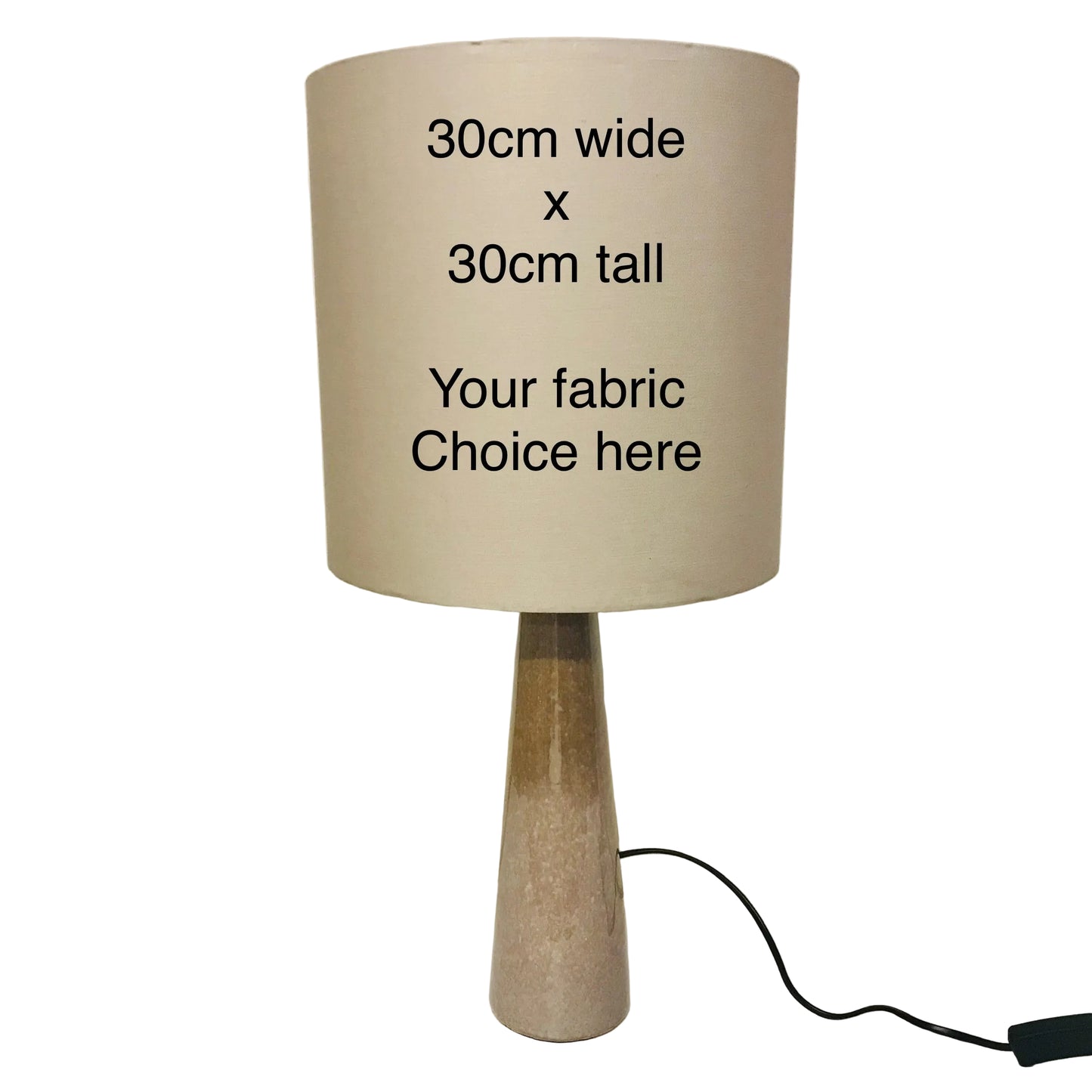 Beige lamp with text indicating size and fabric choice options on a white surface.