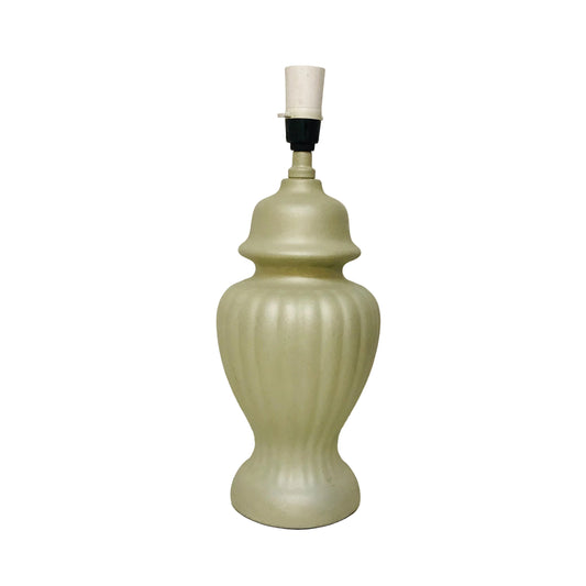 Beige ceramic lamp with a white shade on a white background