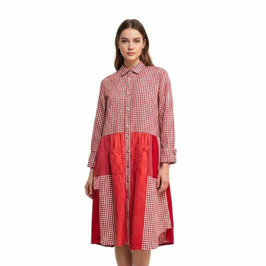Woman wearing a red and white checkered dress on a white background