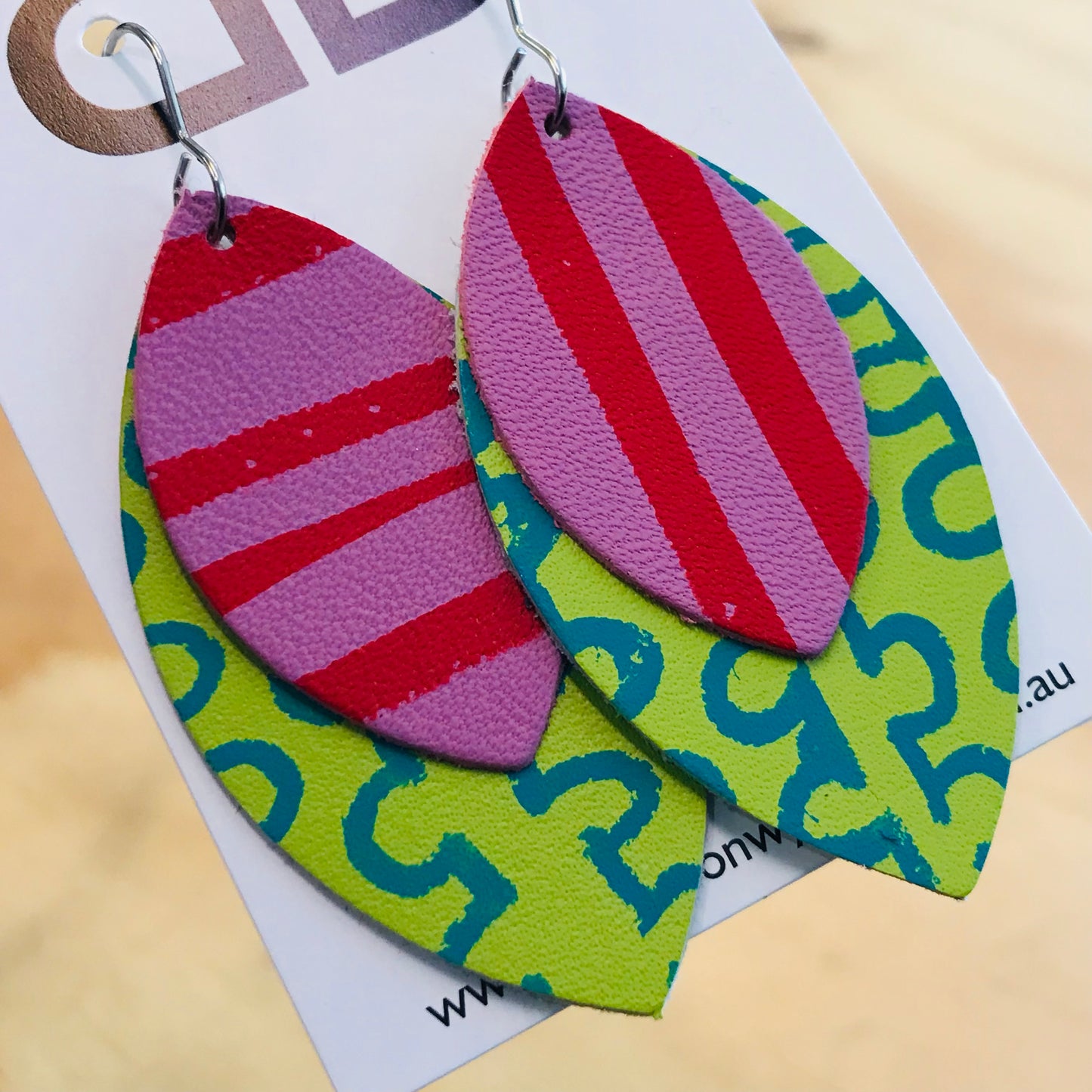 Hand painted leather earrings - The Orbi