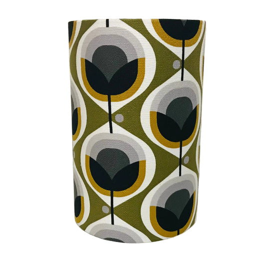 Patterned lampshade with black, gray, and green design on a white background