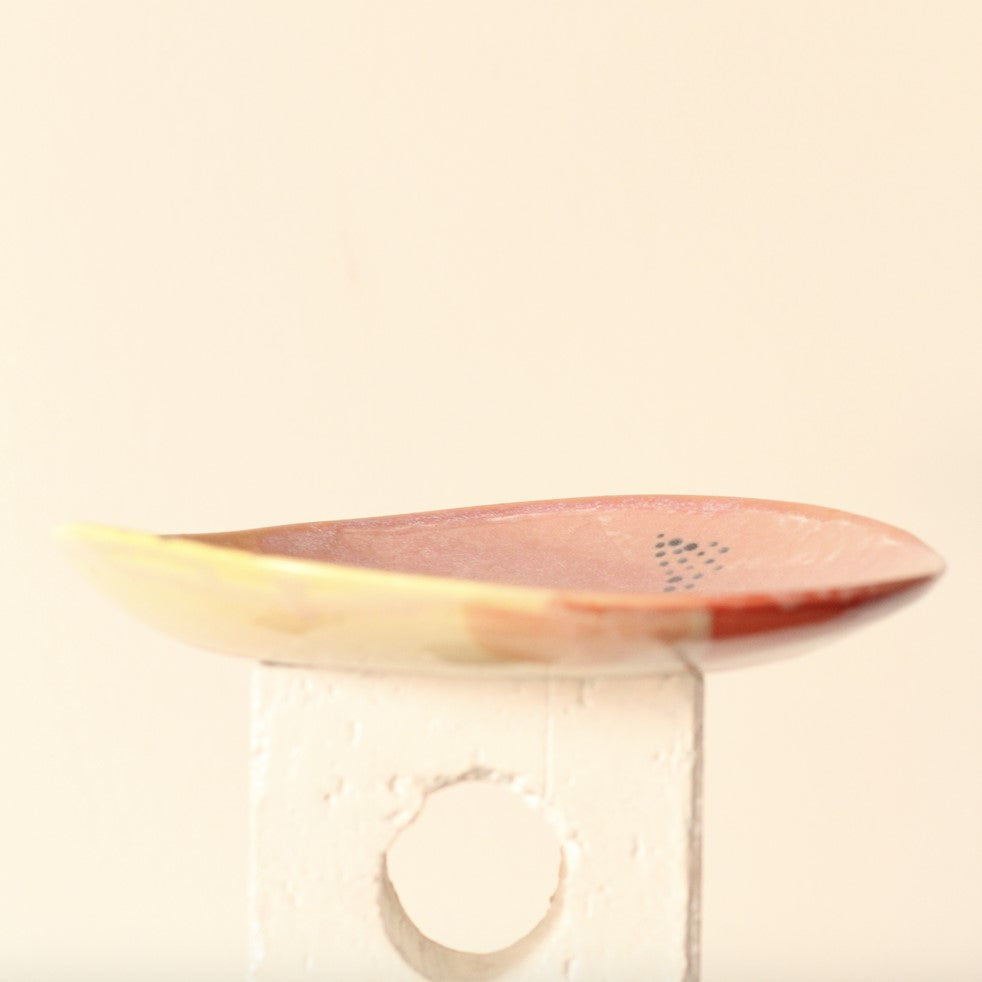 Decorative wall light with a warm glow on a white background