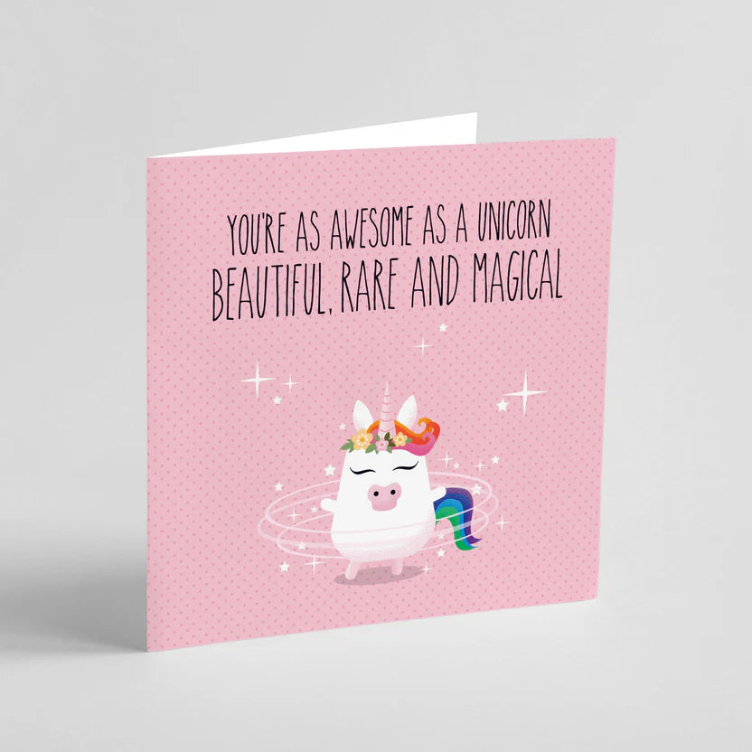 Card with a unicorn illustration and text on a pink background