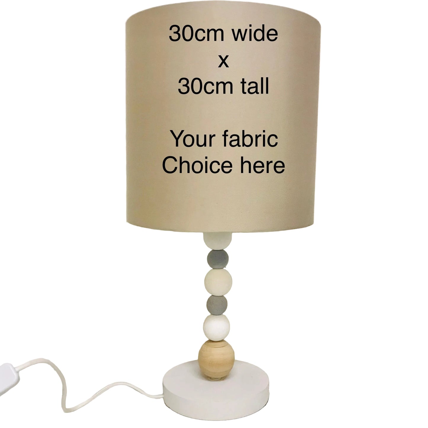 Beige lampshade with text on a neutral background