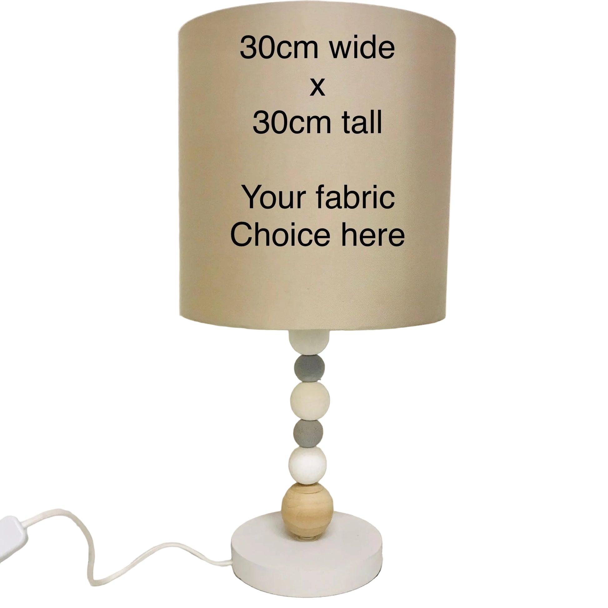 Beige lampshade with text on a neutral background