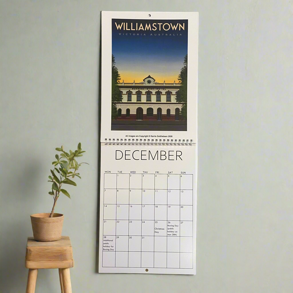 Calendar with a scenic view of Williamstown, Victoria, Australia on a light green wall.