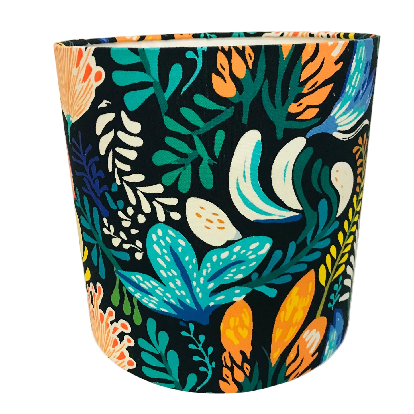 Fabric lamp shade with colorful leaf pattern on a white background