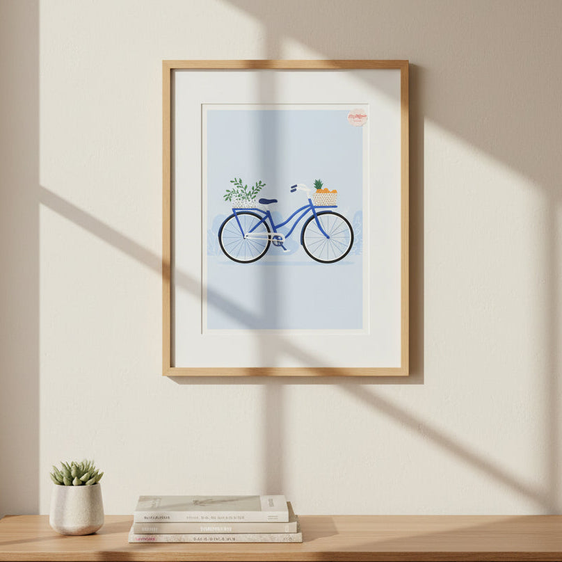 Framed artwork of a blue bicycle with planters on a wooden surface