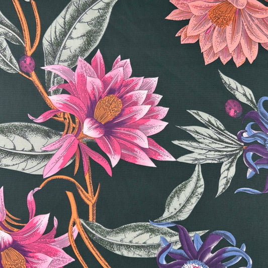 Floral pattern with pink and purple flowers on a dark green background