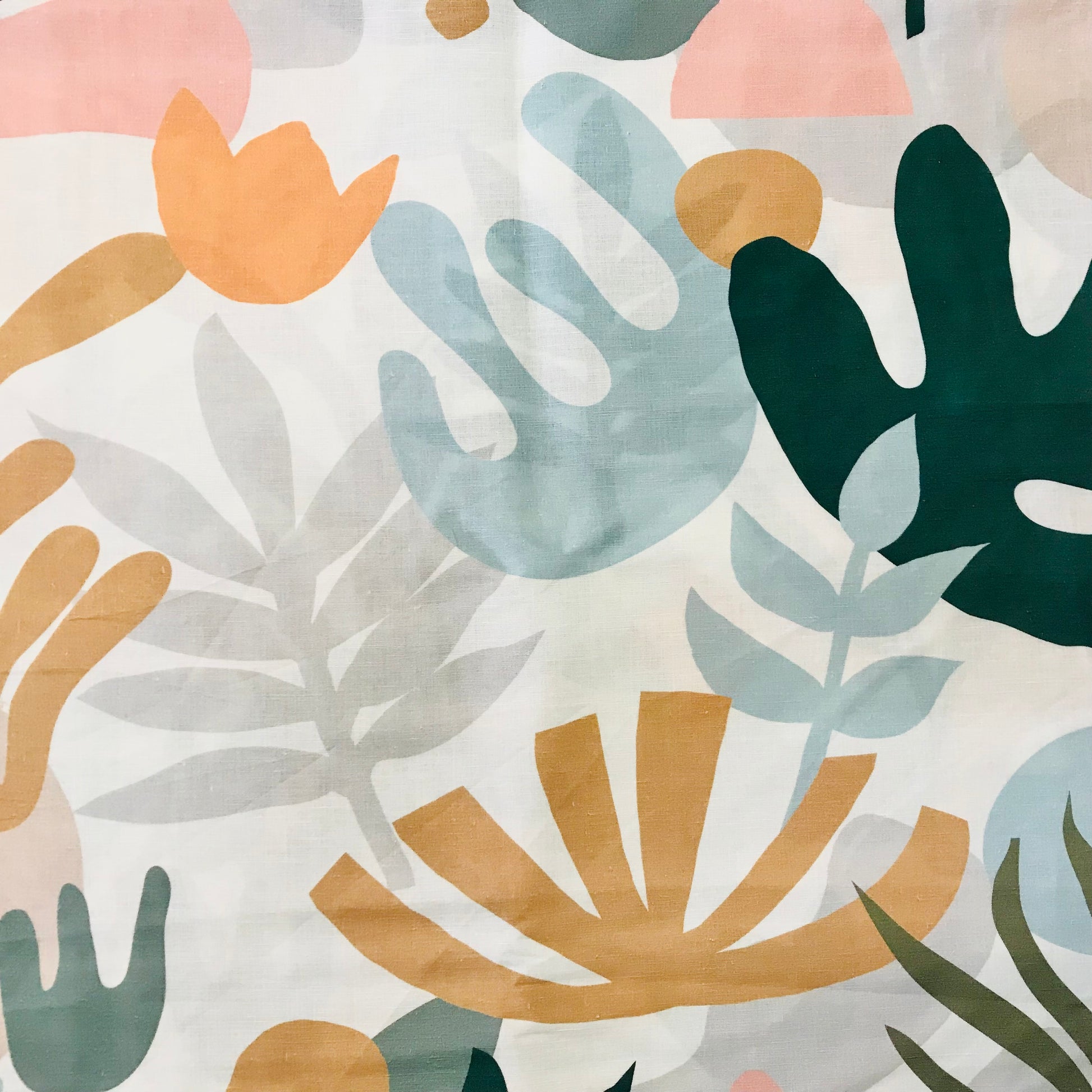 Pattern of colorful leaves on a light background