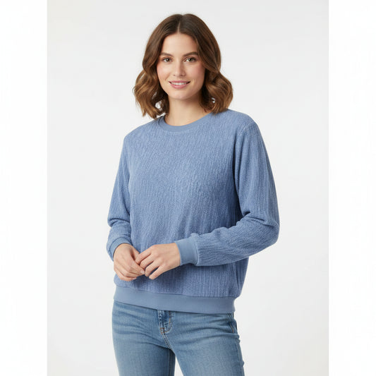 Blue sweater on a mannequin against a white background