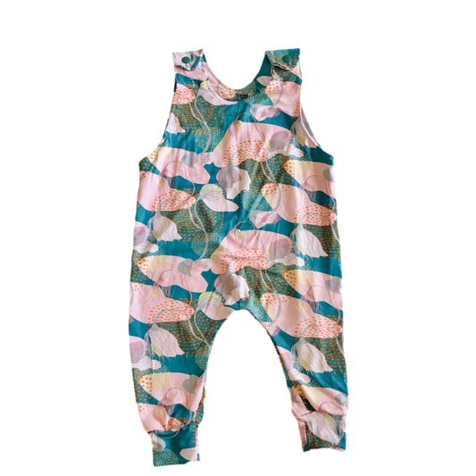 Floral patterned romper on a white background