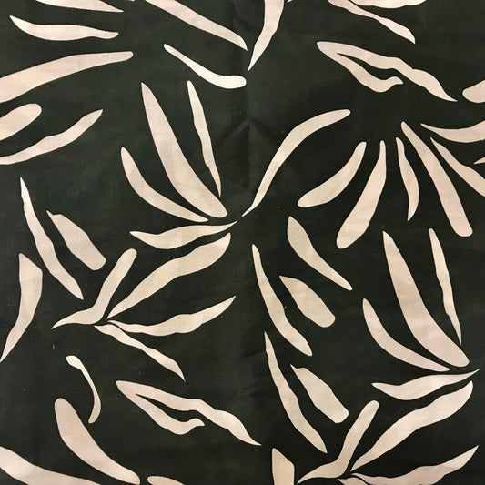 Pattern of white leaves on a black background