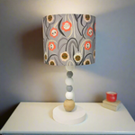 Sunbeam Faces Timber Ball Table Lamp