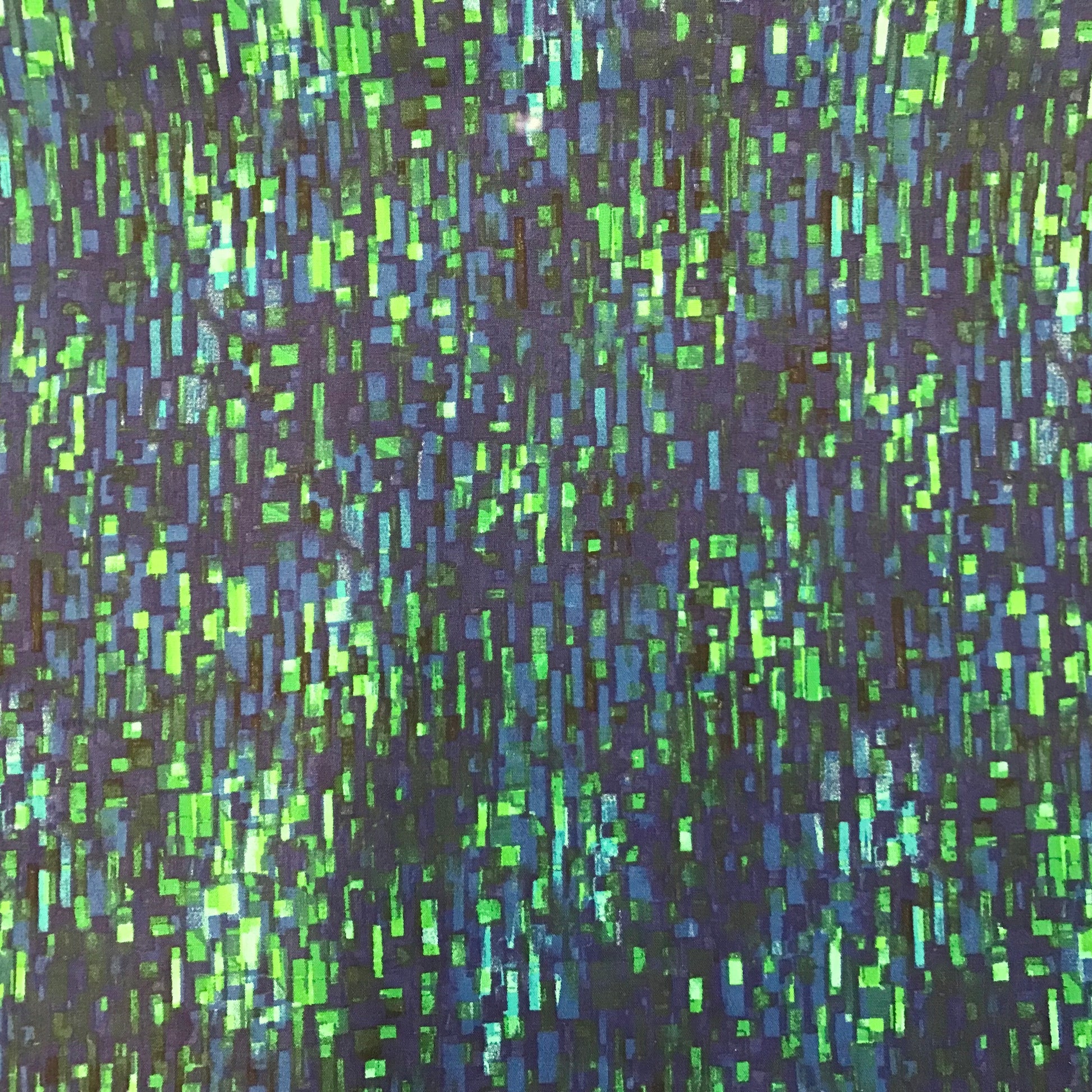 Patterned fabric with green and blue vertical stripes on a dark background