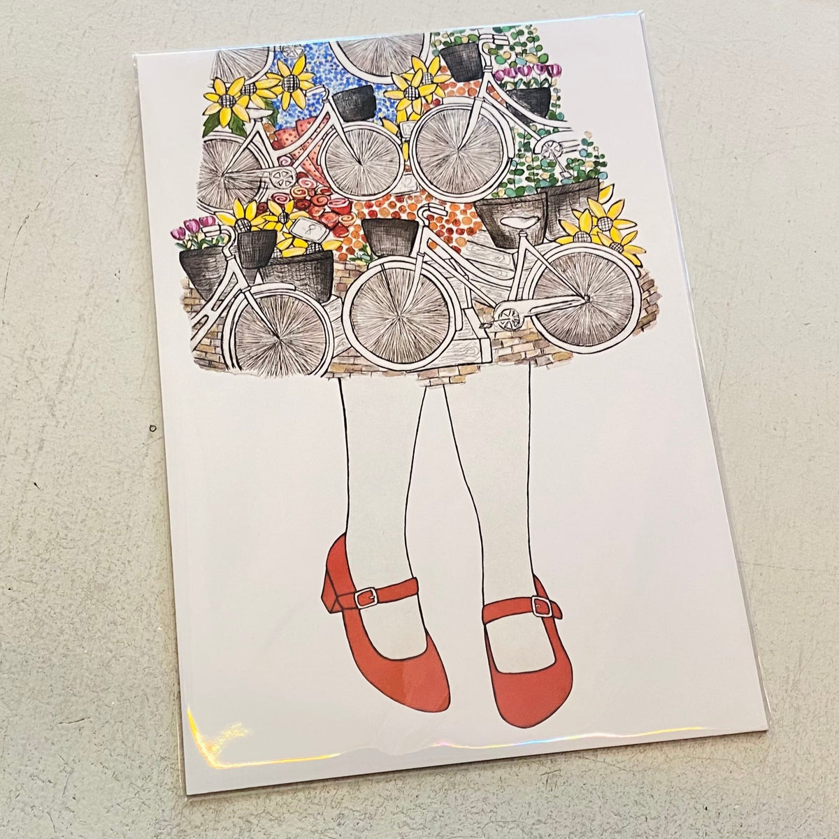 Illustration of a person with bicycles and flowers on a textured surface